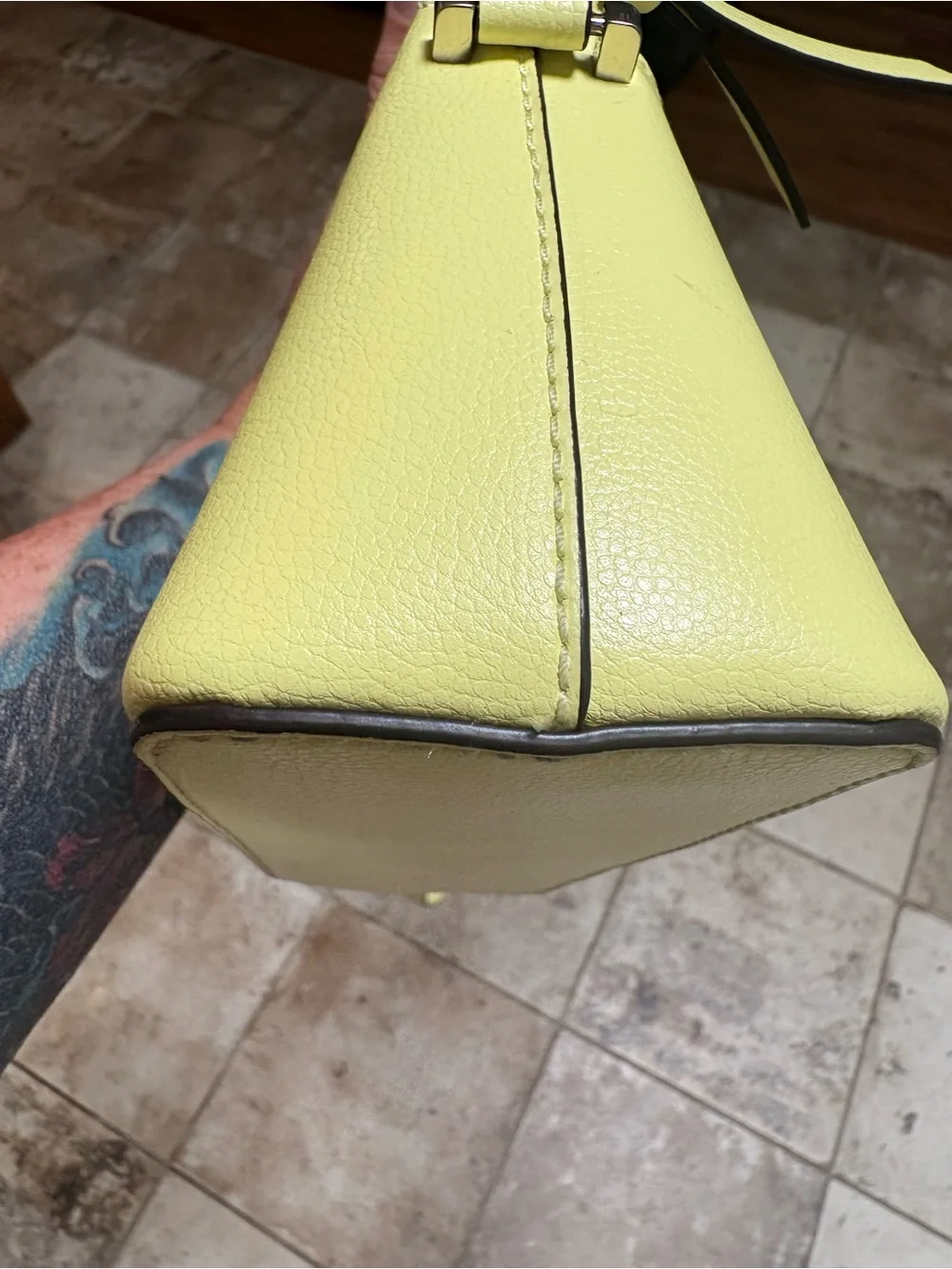 Kate Spade New York saffiano leather crossbody bag yellow